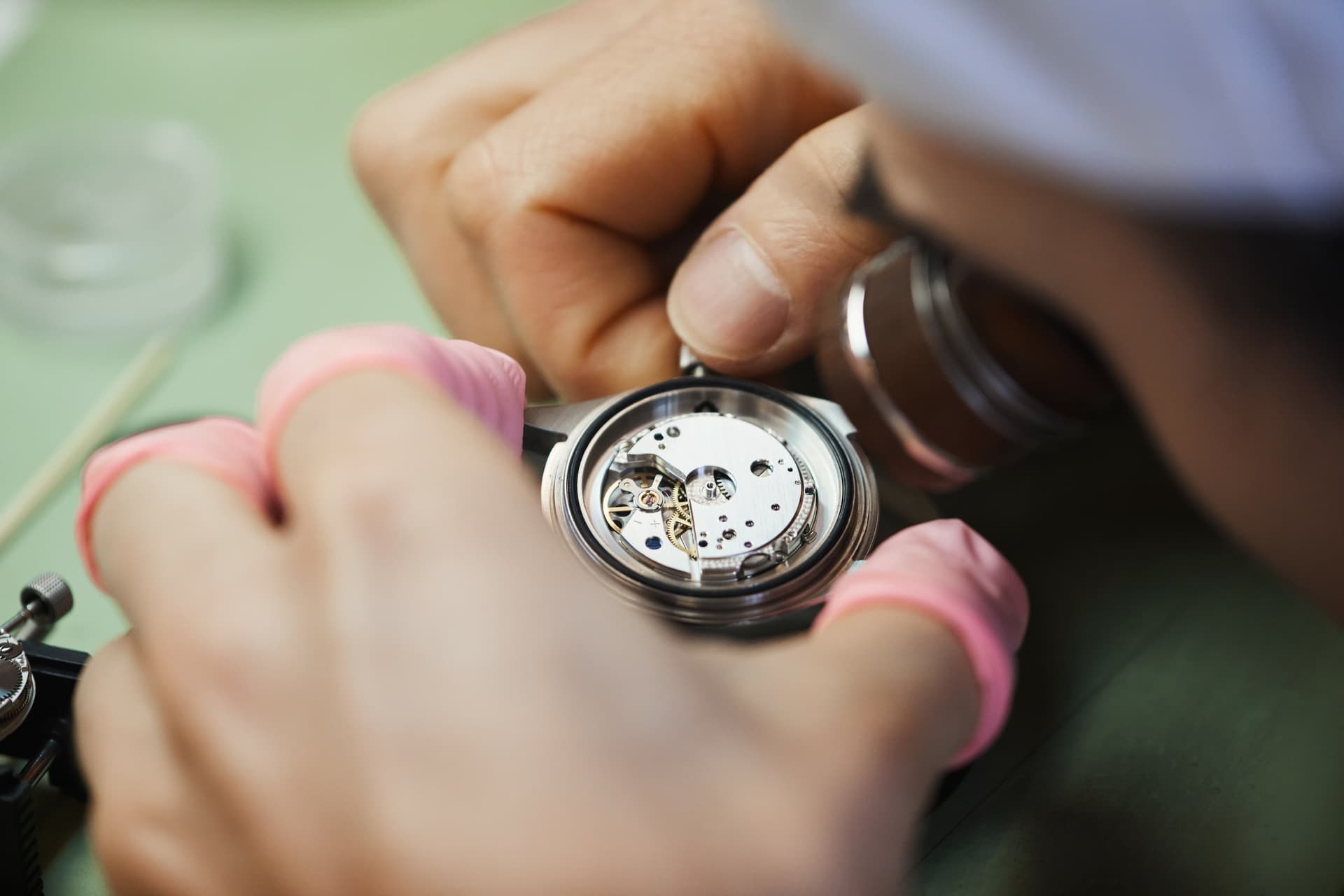 Experts inspecting a watch